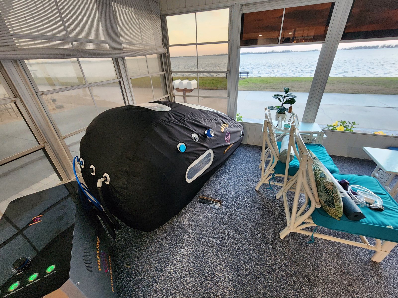 Prestige technicians completing a hyperbaric chamber installation at a client home