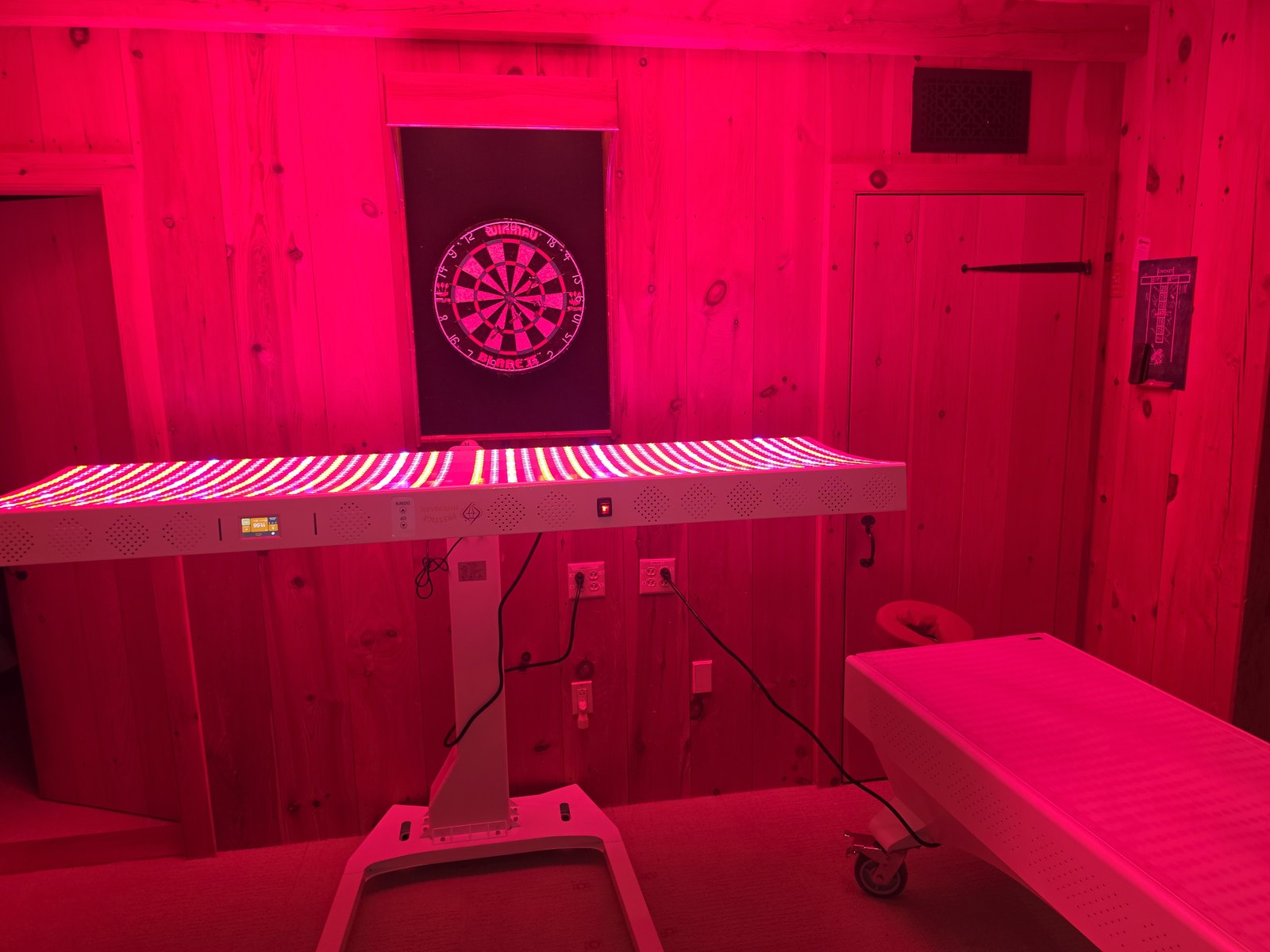 Prestige Pro red light therapy bed installed in a private wellness room